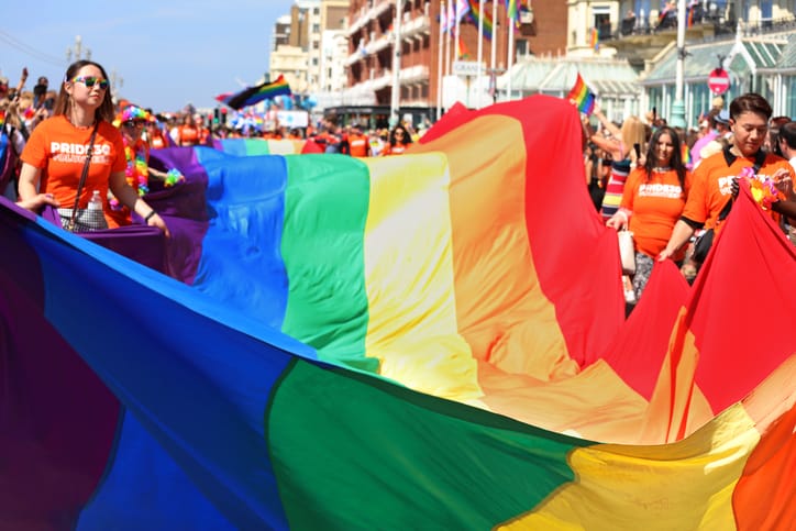 Brighton, England - August 6th 2022: One of the UK's most significant pride events is celebrating its 30th anniversary. Brighton &amp; Hove Pride is intended to celebrate, and promote respect for, diversity and inclusion within the local community and support local charities and causes through fundraising. 
Brighton’s Preston Park was filled with rainbows and glitter, as thousands of people joined the party to celebrate the 30th anniversary of Brighton &amp; Hove Pride. The festivity saw a crowd of around 400,000 people coming together loud and proud on the streets of Brighton and inside the park to celebrate We Are Fabuloso.