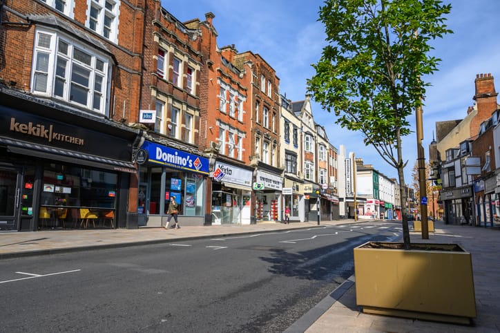 Bromley (London) in Kent, UK. The northern end of Bromley High Street showing shops, restaurants and Bromley Picturehouse.  Few people and no traffic.